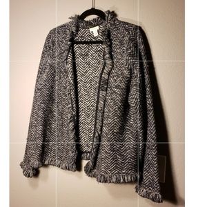 Long sleeve jacket with fringe.